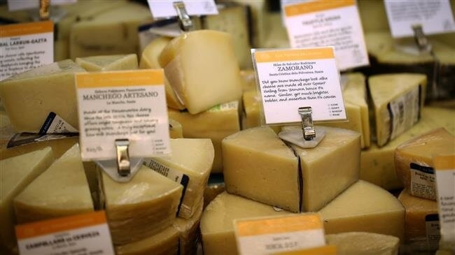 Cheese imported from Spain is displayed at a market in San Francisco, California, on August 26, 2019. (Photo by AFP)