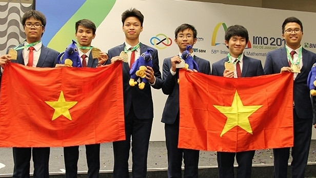 Vietnamese team on the medal podium at the 58th International Mathematical Olympiad 2017, in Brazil. (Credit: NDO)
