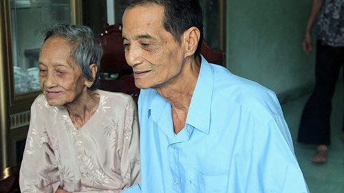 Nguyen Thi Tru and her son