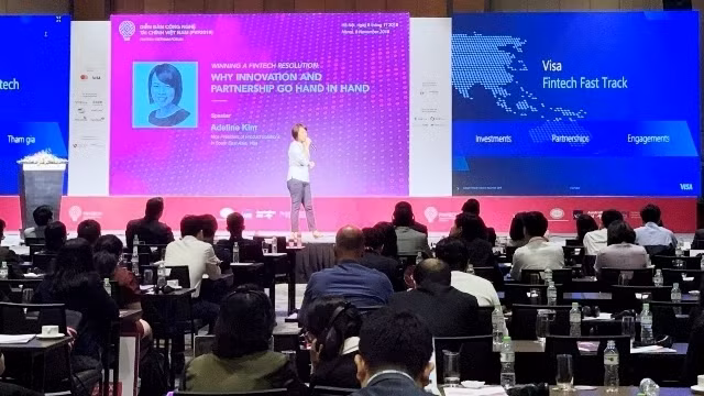 Experts discuss fintech ecosystem development in Vietnam at the forum. (Photo: NDO/Hong Anh)