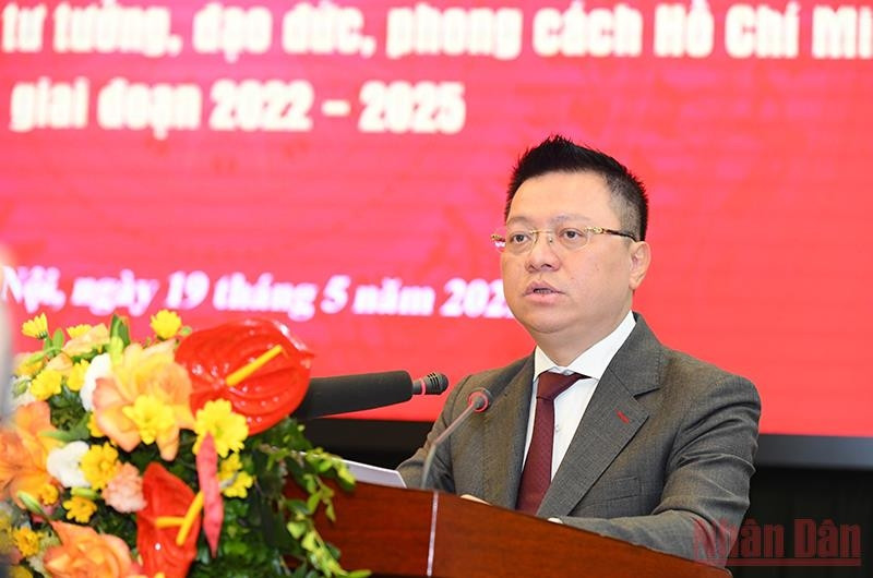 Member of the Party Central Committee and Editor-in-Chief of Nhan Dan Newspaper speaks at the event.(Photo: NDO/Thanh Dat)