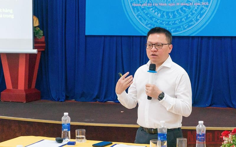 Editor-in-Chief of Nhan Dan Newspaper Le Quoc Minh speaking at the conference.