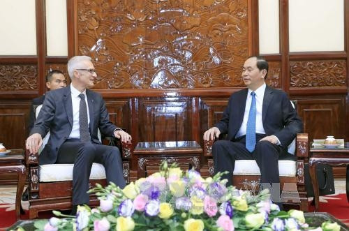 President Tran Dai Quang (right) receives Interpol Secretary General Jurgen Stock.