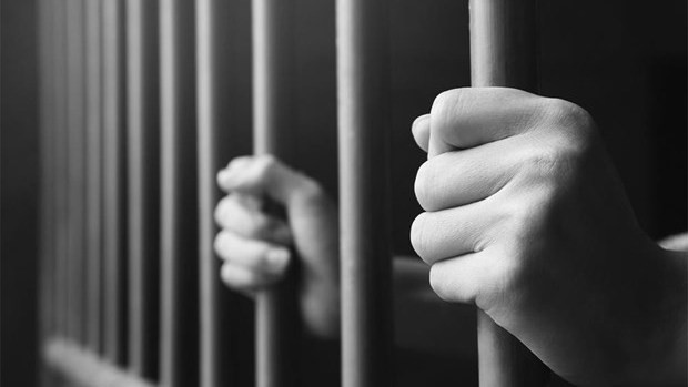 President Nguyen Xuan Phuc on January 28 decides to reduce death penalties to life sentences for four prisoners (Photo: VNA)