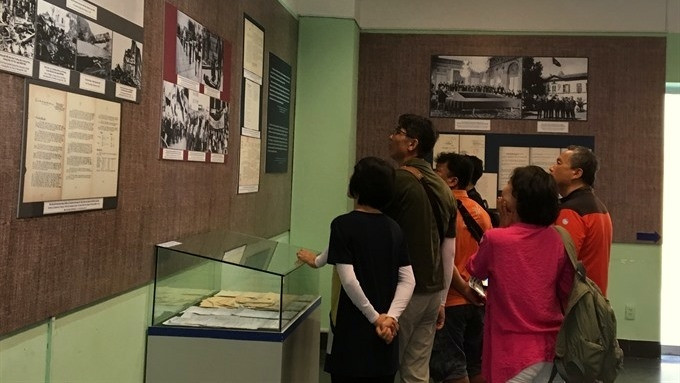Visitors at the exhibition. (Photo: VNA)