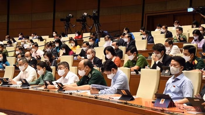Important reports delivered at the ongoing 15th National Assembly’s first sitting on July 22, 2021. (Photo: NDO/Duy Linh)