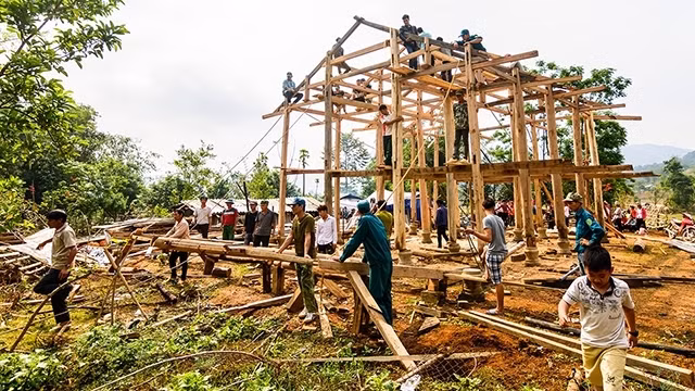 Dozens of men and women in the village came together to help to build the house
