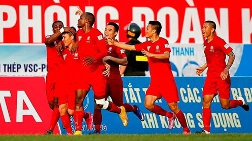 Hai Phong players celebrate a goal against Quang Ninh Coal on April 23.