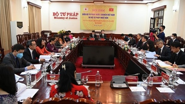 Deputy Minister of Justice Nguyen Khanh Ngoc holds talks with visiting Japanese Minister of Justice Furukawa Yoshihisa in Hanoi on June 29. (Photo: VGP)