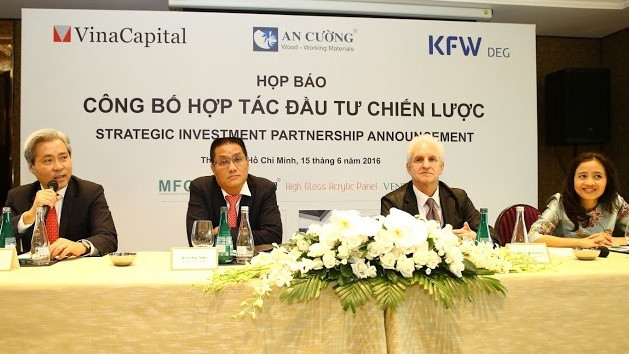 Representatives of VinaCapital, DEG and An Cuong Company at the press brief on June 15.