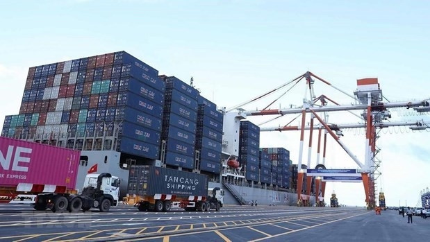  Goods loading and unloading activities at Hai Phong International Container Terminal. (Image for illustration/Photo: VNA)