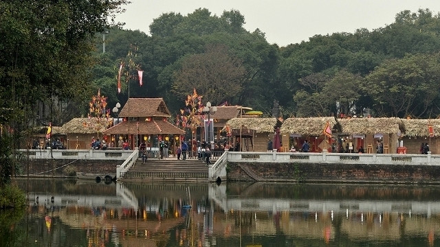 Van (Literature) Pond in Hanoi’s Temple of Literature decorated in the traditional style, recreating an old Tet atmosphere.