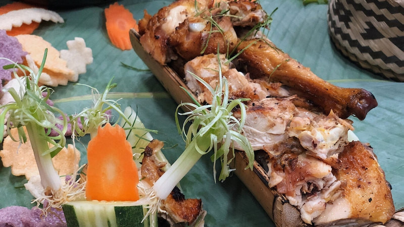 Grilled chicken in bamboo tube