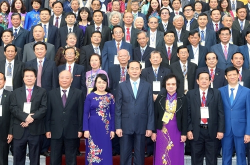 President Tran Dai Quang and outstanding preventive medicine workers. (Credit: VNA)
