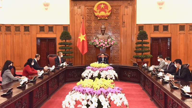 The meeting between PM Pham Minh Chinh and WHO Regional Director for the Western Pacific Takeshi Kasai (Photo: Tran Hai)