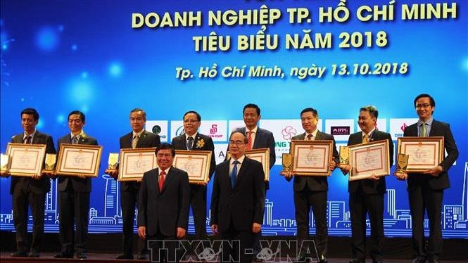 Outstanding businesses and entrepreneurs in Ho Chi Minh City honoured at a ceremony on October 13 (Photo: VNA)