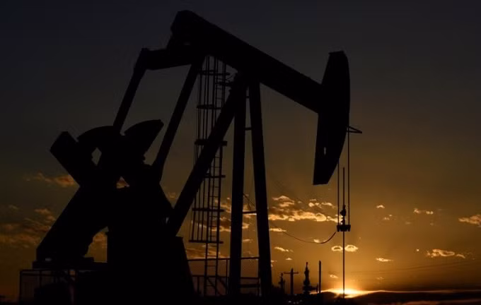 A pump jack on a lease owned by Parsley Energy operates at sunset in the Permian Basin near Midland, Texas US, August 23, 2018. (Reuters)
