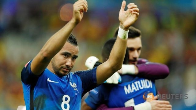 France’s Dimitri Payet celebrates after the game. (Photo: Reuters)