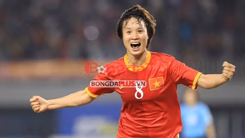 Striker Minh Nguyet celebrates her opening goal