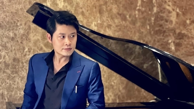 Composer Nguyen Van Chung is known to Vietnamese audiences for his songs about love and family. (Photo: VNA)