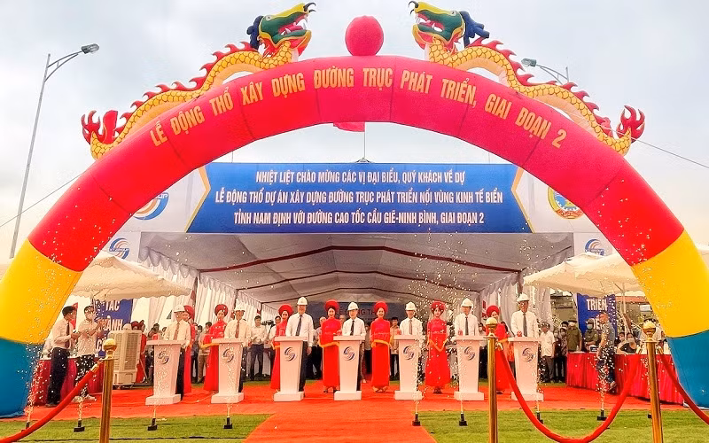 At the groundbreaking ceremony for the road.