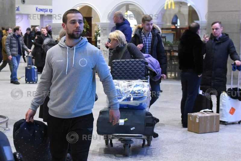 Russian Olympic curler Alexander Krushelnitsky returns from the PyeongChang 2018 Winter Olympics, at Pulkovo airport outside St. Petersburg, Russia February 22, 2018. (Photo:Reuters)