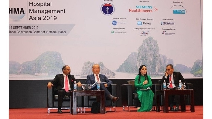 Vietnamese Minister of Health Nguyen Thi Kim Tien (in green) speaks at the event. (Photo: NDO/Lam Tran)