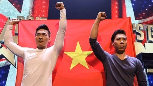 The Giang Brothers hold their national flag aloft at Britain’s Got Talent 2018