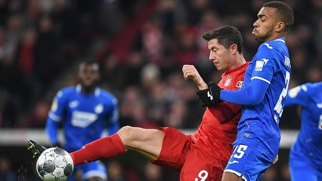 DFB Cup - Third Round - Bayern Munich v TSG 1899 Hoffenheim - Allianz Arena, Munich, Germany - February 5, 2020 Bayern Munich's Robert Lewandowski in action with TSG 1899 Hoffenheim's Kevin Akpoguma. (Photo: Reuters)