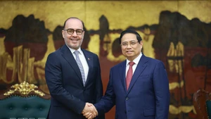 Prime Minister Pham Minh Chinh receives Qatari Ambassador Khalid Ali Abdullah Abel on March 17. (Photo: VNA)