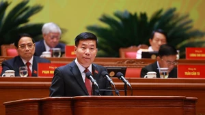 Member of the Party Central Committee, Deputy Minister of Foreign Affairs Nguyen Manh Cuong delivers a presentation at the 14th National Party Congress. (Photo: VNA)