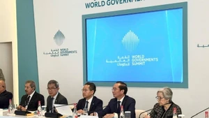 Associate Professor, Dr Nguyen Ba Chien — Director of the Viet Nam Academy of Public Administration and Governance — attends and speaks at the roundtable.