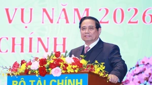 Prime Minister Pham Minh Chinh speaks at a conference reviewing the finance sector’s financial, budgetary, investment and socio-economic development efforts in 2025 and outlining tasks for 2026 held in Ha Noi on January 6. (Photo: VNA)