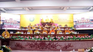 The handover ceremony at the Dinh Ba International Border Gate (Photo: VNA)