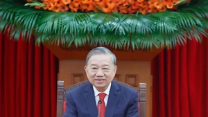 General Secretary of the CPV Central Committee To Lam at the phone talks with General Secretary of the CPC Central Committee and President of China Xi Jinping on January 26 (Photo: VNA)