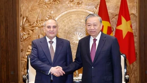 General Secretary of the Communist Party of Viet Nam Central Committee To Lam (right) receives Deputy Chairman and head of the Central Office of the New Azerbaijan Party (YAP) Tahir Budagov in Ha Noi on January 26. (Photo: VNA)