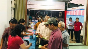 Voters in Cai Von Ward, Vinh Long Province, cast their ballots very early.