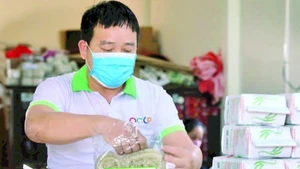 Chu rice noodles being produced and packaged at Thuan Hung Cooperative. (Photo: nhandan.vn)