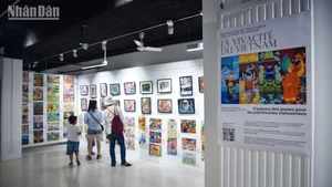 Each painting offers a unique perspective of young people narrating stories of their Vietnamese homeland. (Photo: KHAI HOAN)