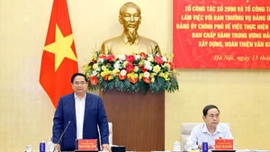 Prime Minister Pham Minh Chinh speaks at the working session on July 15 to review the implementation of Resolution No. 60-NQ/TW. (Photo: VNA)
