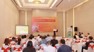 Representatives of enterprises and press agencies at the press briefing.
