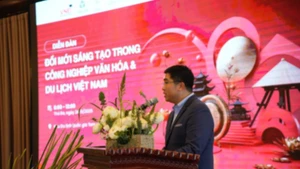 Dr Nguyen Trung Dung, Chairman of VNEI, delivering the opening remarks. (Photo: nhandan.vn)
