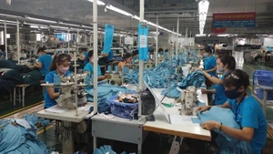 Garment production for export at Hanosimex Dong Van Garment Factory. (Photo: MINH DUC–TRINH BINH)
