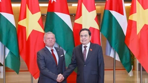 National Assembly (NA) Chairman Tran Thanh Man (right) and King of the Hashemite Kingdom of Jordan Abdullah II Ibn Al Hussein (Photo: VNA)
