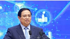 Prime Minister Pham Minh Chinh addressing the forum (Photo: VNA)