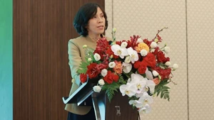 Lai Viet Anh, Deputy Head of the Department of E-commerce and Digital Economy, Ministry of Industry and Trade speaking at the event. (Photo: nhandan.vn)