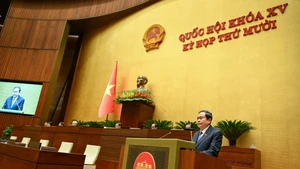 NA Chairman Tran Thanh Man delivers the closing remarks at the 10th session of the 15th NA. (Photo: DUY LINH)