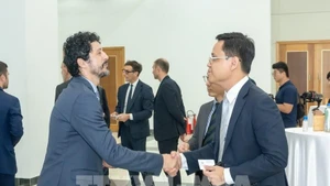 Representatives from Vietnamese and Italian businesses at the event. (Photo: VNA)