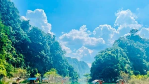 Visitors explore the Dong Lam grassland in Lang Son.