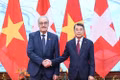 Prime Minister Le Minh Hung and Swiss President Guy Parmelin. (Photo: nhandan.vn)